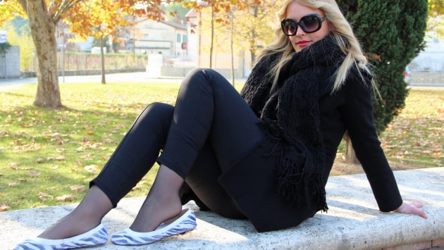 Dollface Christelle showing off her nyloned feet outdoors